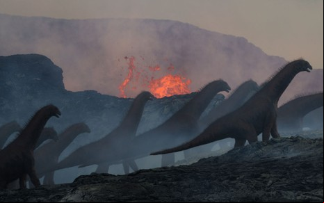 Isissauros am na frente de um vulcão em erupção em imagem feita por computador