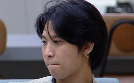 Marcel Hayashi, o Cel de A Grande Conquista, está com os lábios unidos e sem expressão