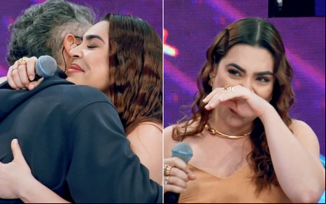 Marcos Mion abraça Naiara Azevedo à esquerda; a cantora chora à direita no Caldeirão