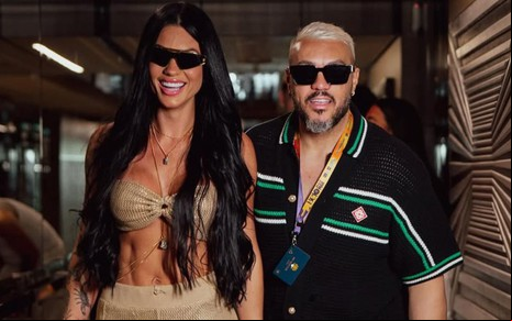 Foto mostra Rayane Figliuzzi ao lado de Belo